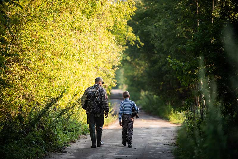 father and son hunting together